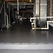 Materiał Belzona 5231 (SG Laminate) zastosowany do naprawy i zabezpieczenia nieszczelnej podłogi bez zakłócenia funkcjonowania szpitala